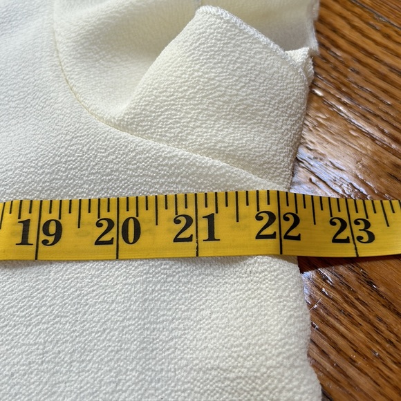 Perfect Peach cream color ruffle sleeve top.  Size Large.  Excellent condition. - Picture 7 of 10